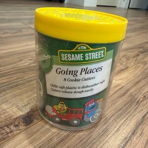 Vintage Sesame Street 8 Piece Cookie Cutter Set with Yellow Lid by Wilton